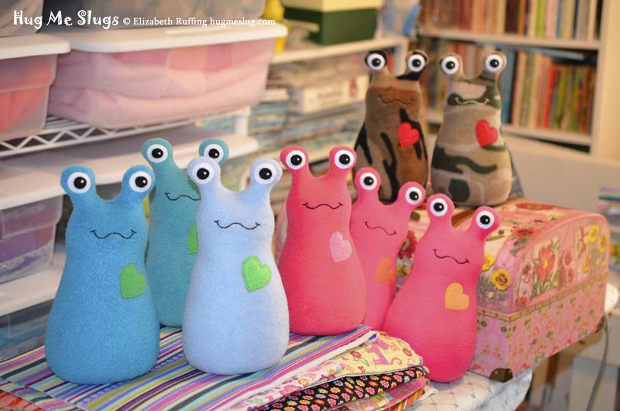 Hug Me Slugs handmade stuffed animal banana slugs by artist Elizabeth Ruffing