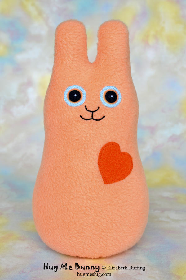 Hug Me Bunny plush art toy, soft orange fleece plushie, by Elizabeth Ruffing
