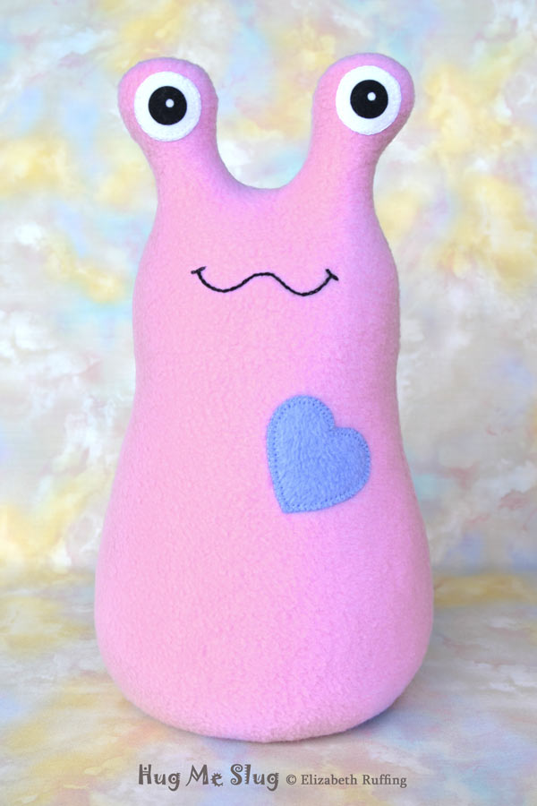 12 inch Handmade Lavender-pink Hug Me Slug Stuffed Animal Plush Art Toy with Periwinkle Blue Heart by artist Elizabeth Ruffing