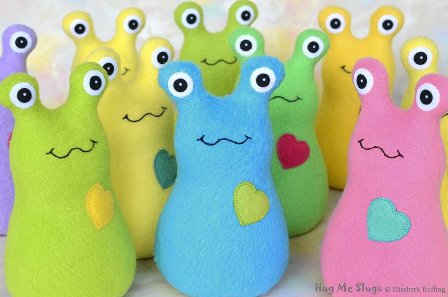 Assorted Handmade Fleece Hug Me Slug Stuffed Animal Plush Art Toys, by artist Elizabeth Ruffing