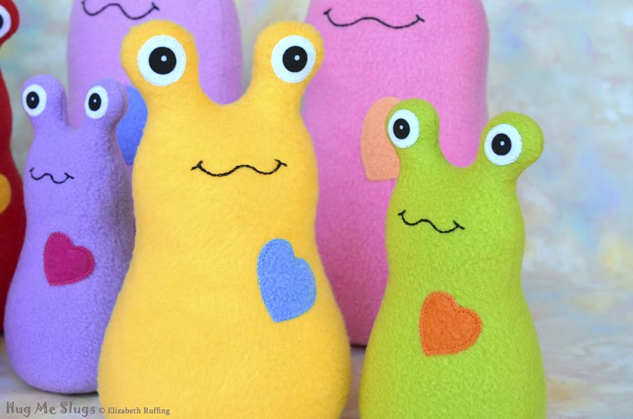Hug Me Slug handmade plush stuffed toy animals by Elizabeth Ruffing, assorted colors