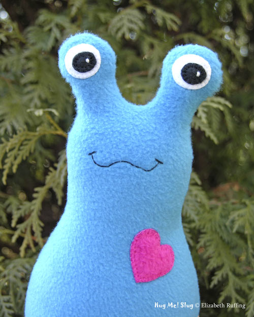 Turquoise-blue Fleece Hug Me Slug by Elizabeth Ruffing