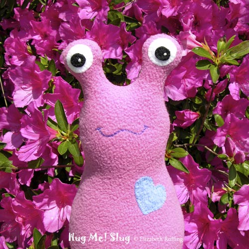 Mauve-pink Fleece Hug Me Slug by Elizabeth Ruffing