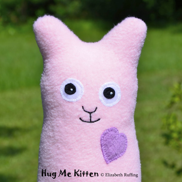 Pink fleece Hug Me Kitten by Elizabeth Ruffing