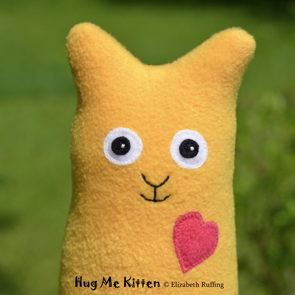 Gold fleece Hug Me Kitten by Elizabeth Ruffing
