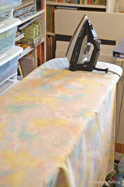 Photographing art dolls, ironing the backdrop, photo by Elizabeth Ruffing