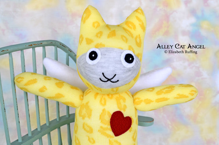 Yellow animal print Alley Cat Angel Sock Kitten by Elizabeth Ruffing