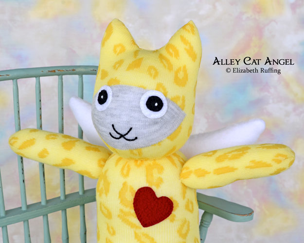 Yellow animal print Alley Cat Angel Sock Kitten by Elizabeth Ruffing