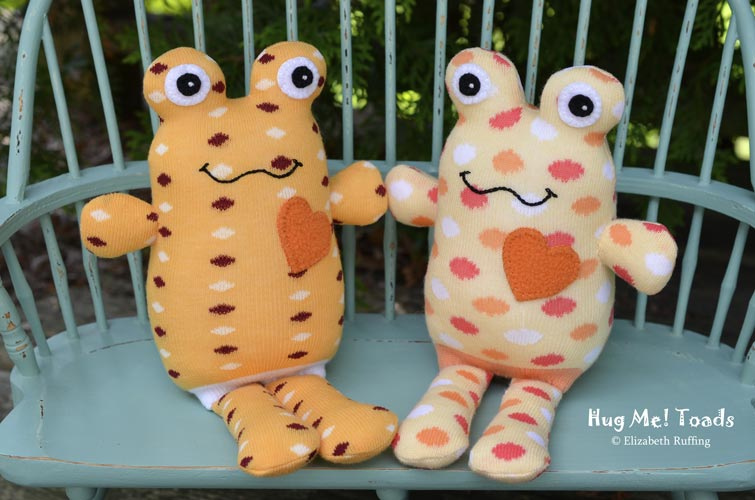 Soft Yellow and Orange Hug Me Sock Toads, with polka dots, original art toys by Elizabeth Ruffing