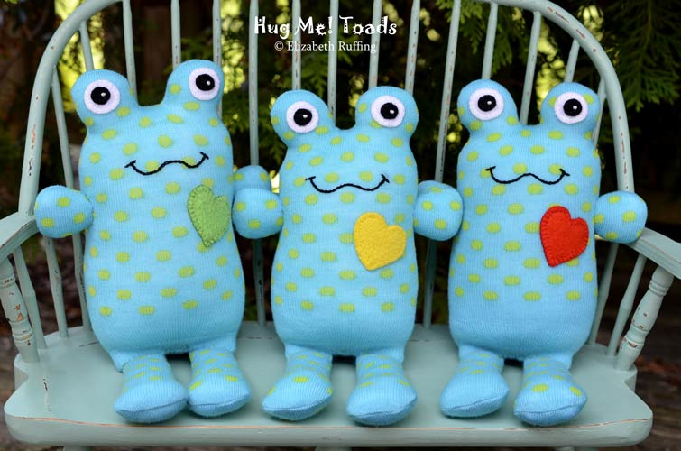 Turquoise Hug Me Sock Toads, with polka dots, original art toys by Elizabeth Ruffing
