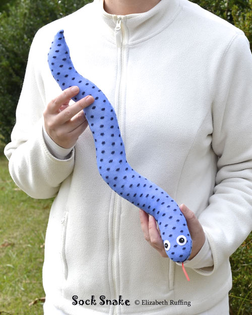 Blue polka dotted sock snake, original art toy by Elizabeth Ruffing