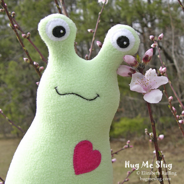 Slugterra and mint green fleece Hug Me Slug with peach blossom, original stuffed animal art toy by Elizabeth Ruffing