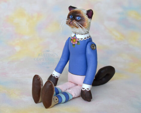 Back view of Himalayan cat art doll, with her tail helping her sit up